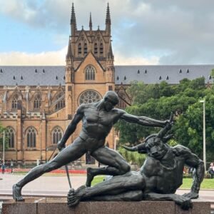 Saint Mary's Cathedral in Sydney with Hyde Park fountain sculpture in foreground.